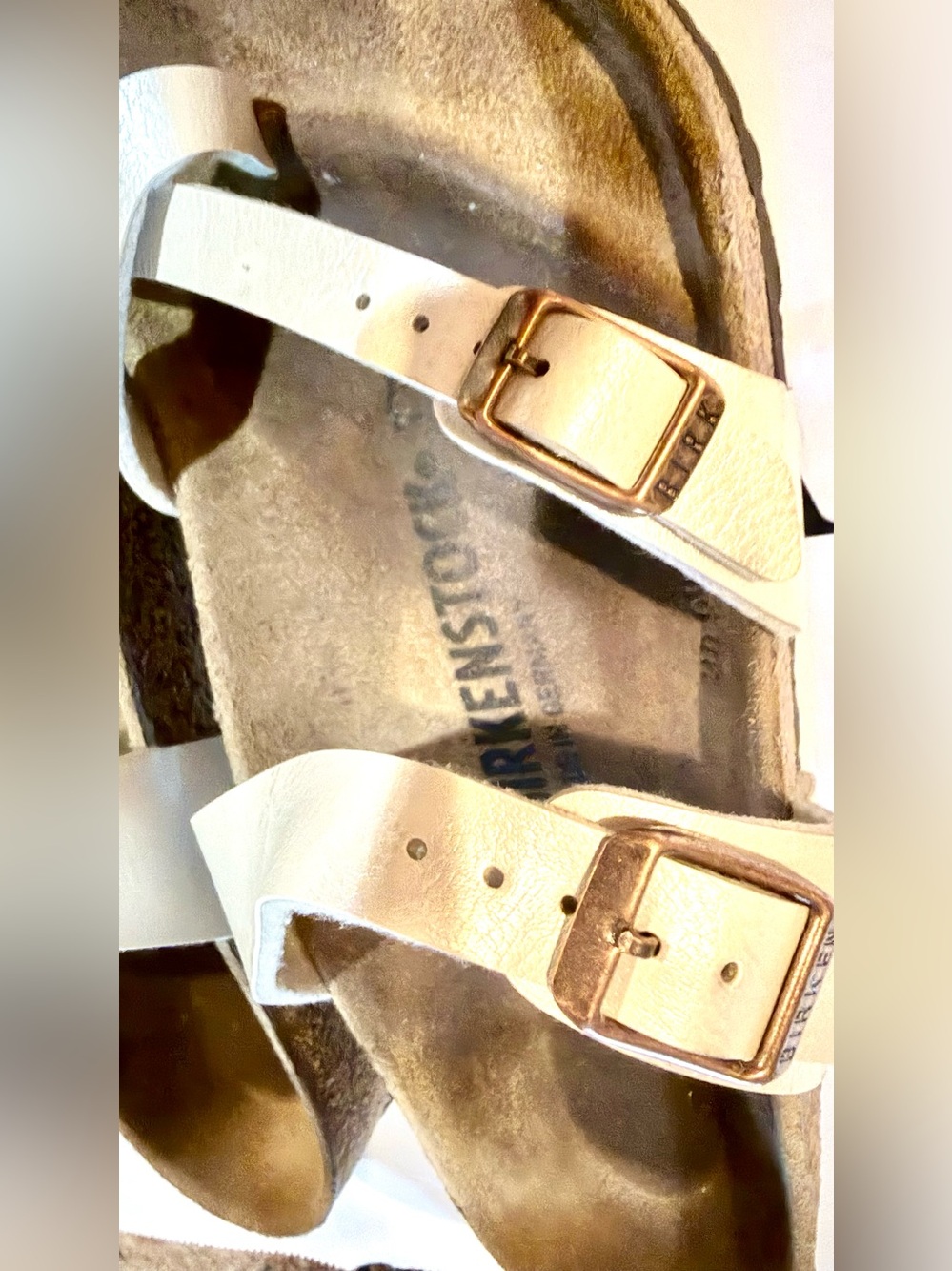 Birkenstock Metallic Cream Cross-Strap Sandals with Rose Gold Buckles - Picture 12 of 14
